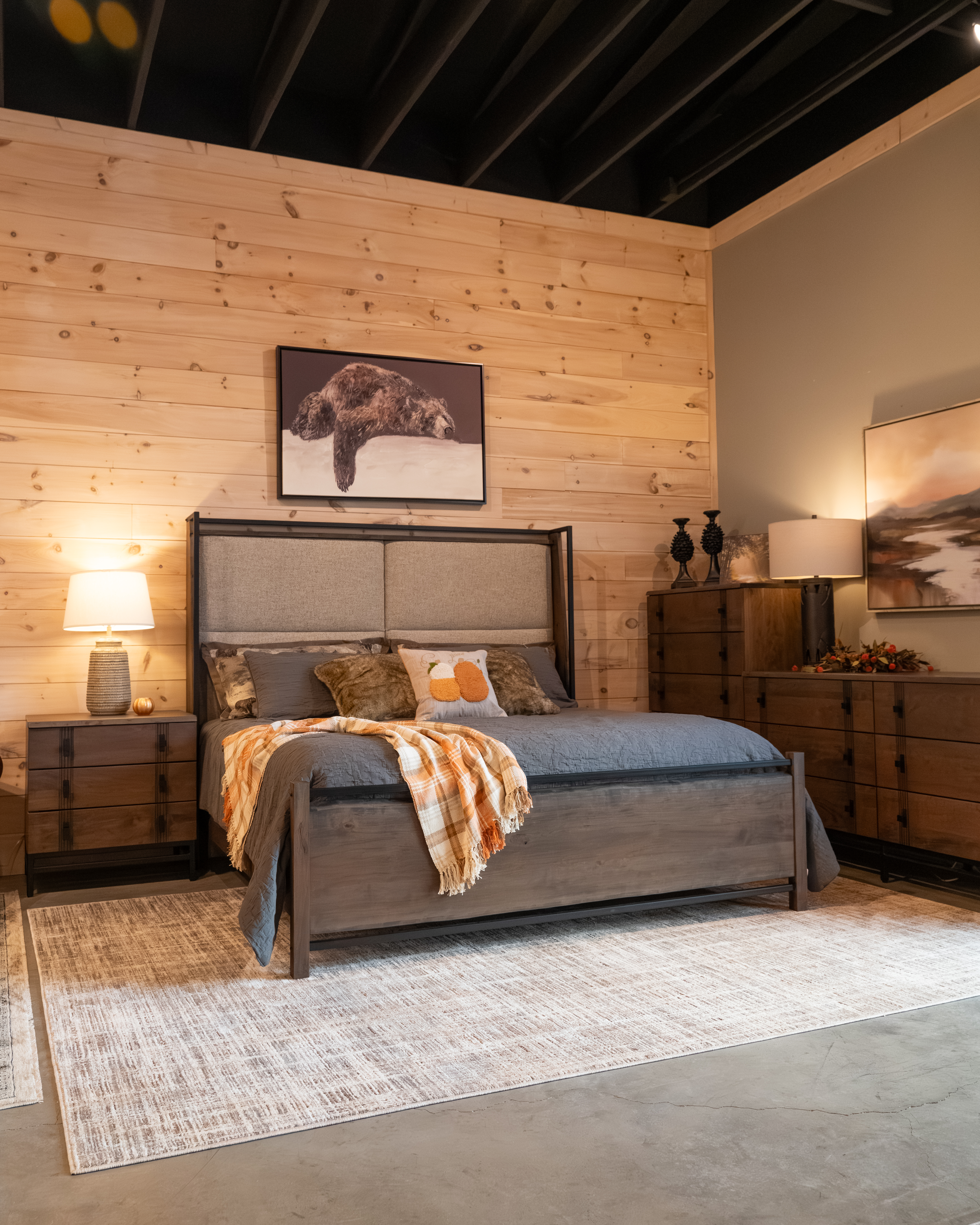 Abshire bed in cherry with live edge and fabric headboard