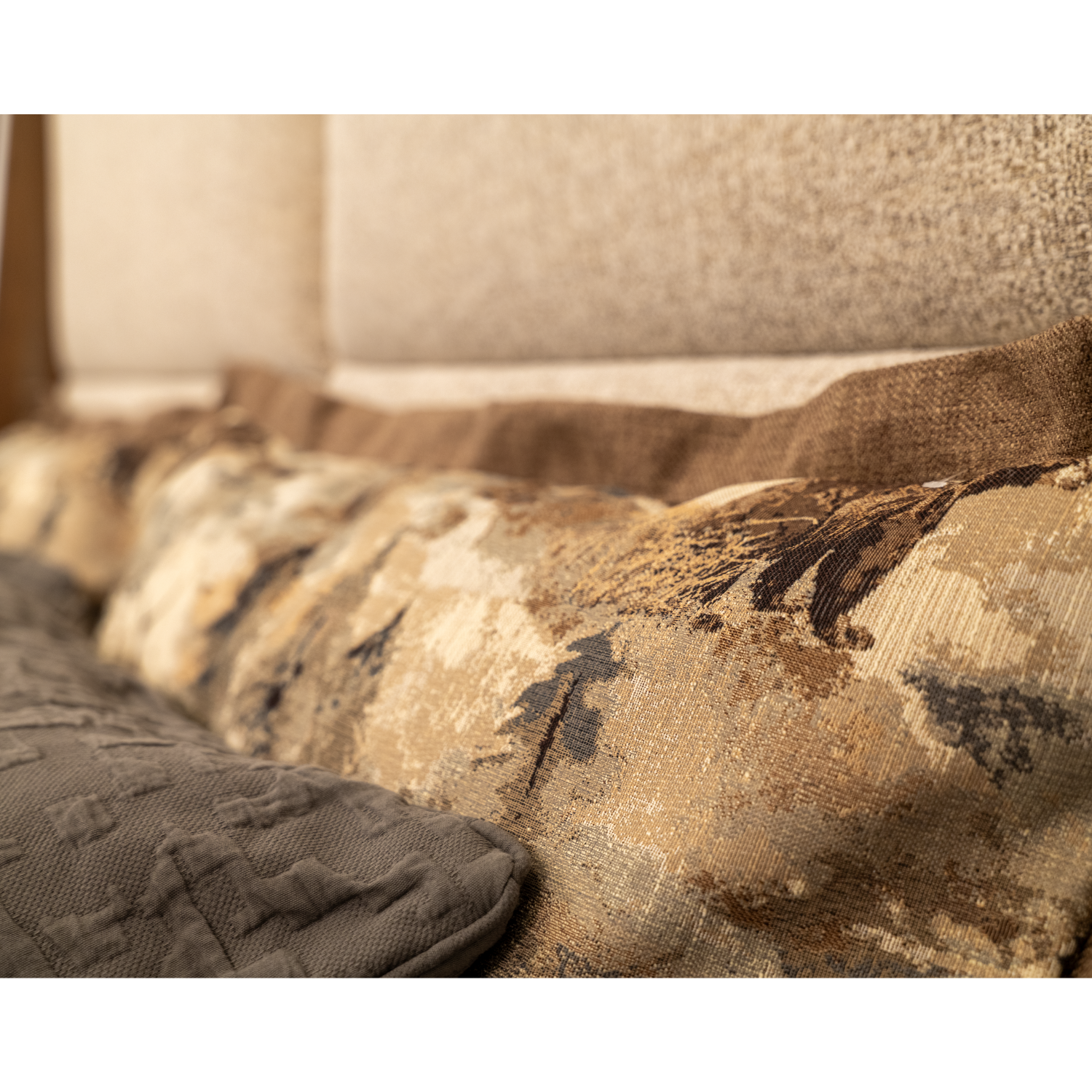 upholstered headboard bed with rustic bed spread