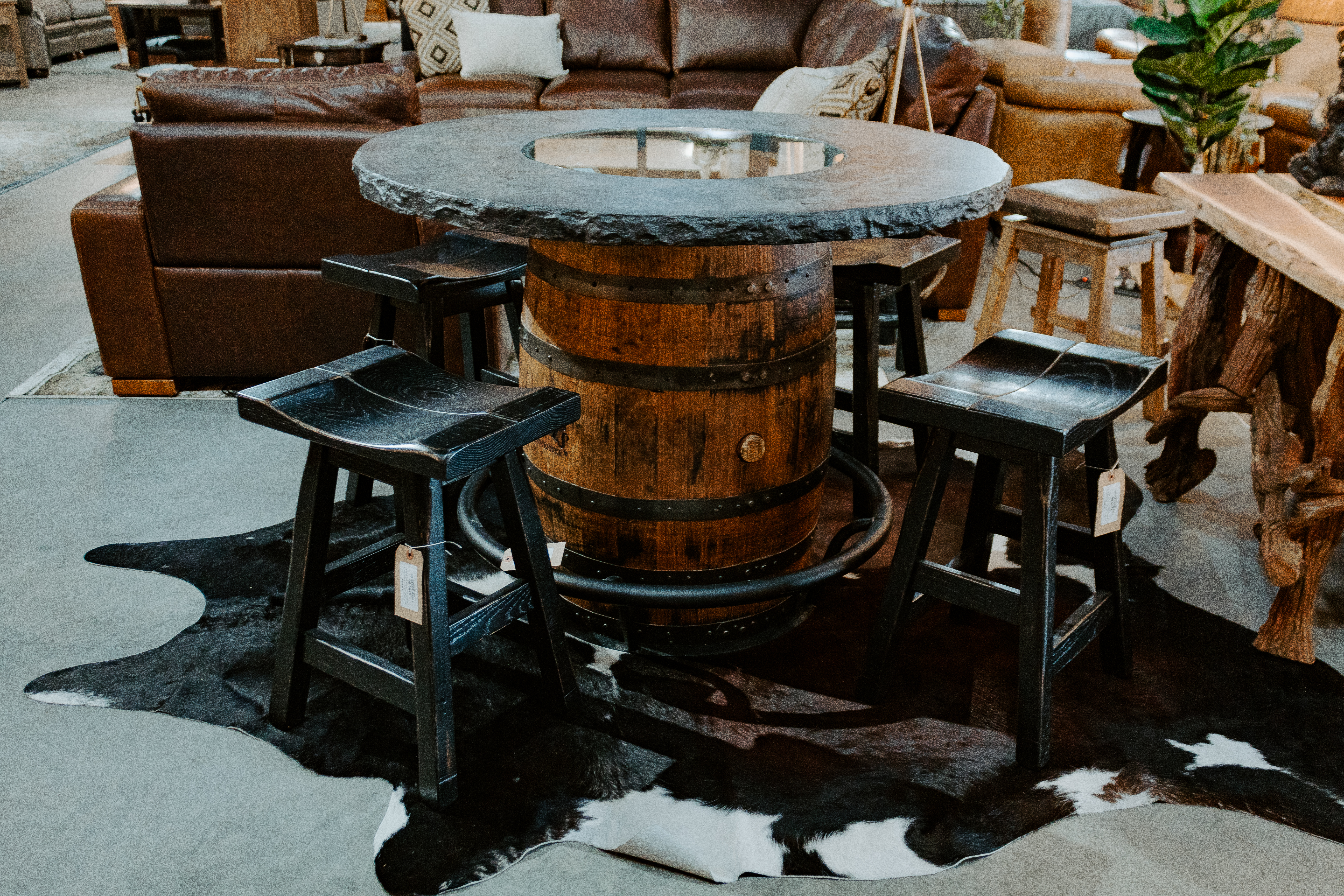 Concrete Barrel Table with Saddle Swivel Stools