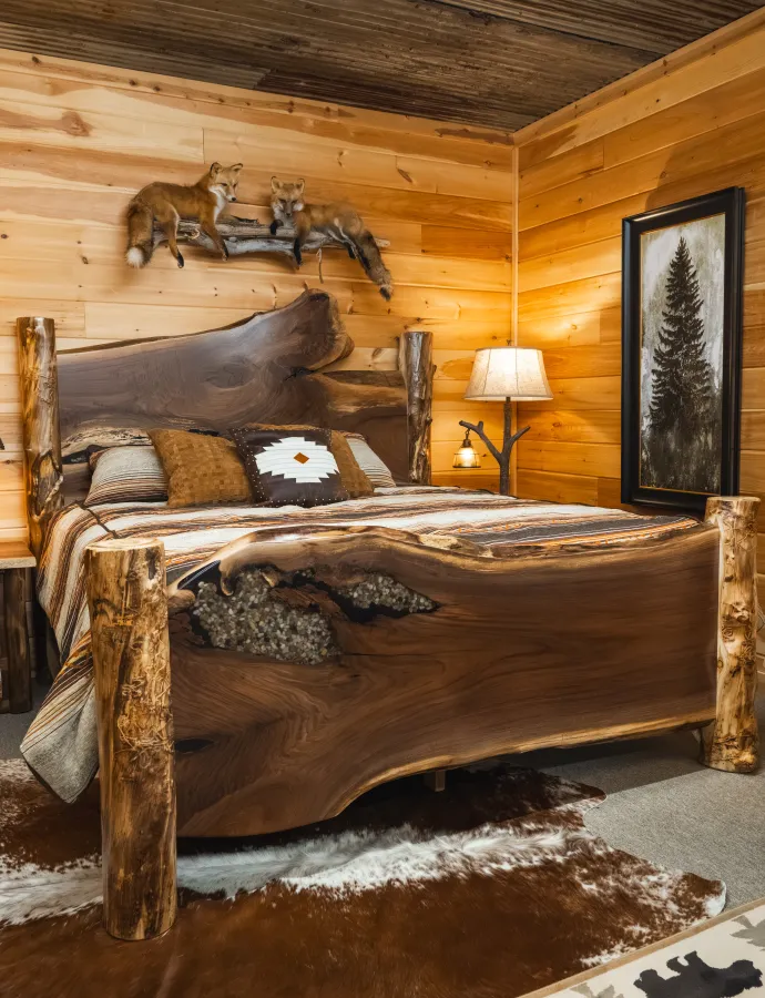 live edge slab bed with river rocks epoxy