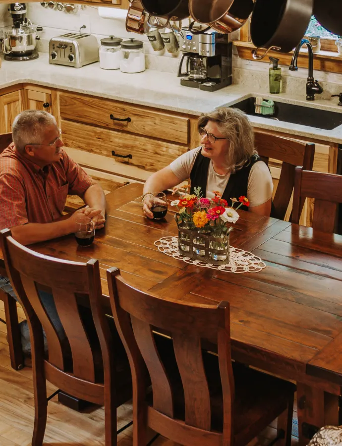 Couple at Rustic Dining Table