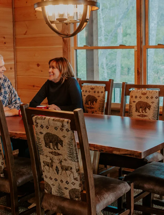 Couple at Rustic Slab Dining Table